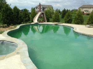 This is one of our pools where there is some iron in the source water. The pH level drifted up as a result of the chlorine generator producing chlorine and adding a constant increase in pH as well. The pool was treated by lowering the pH and alkalinity, as well as adding a metal removing product, FerriTabs to the water.