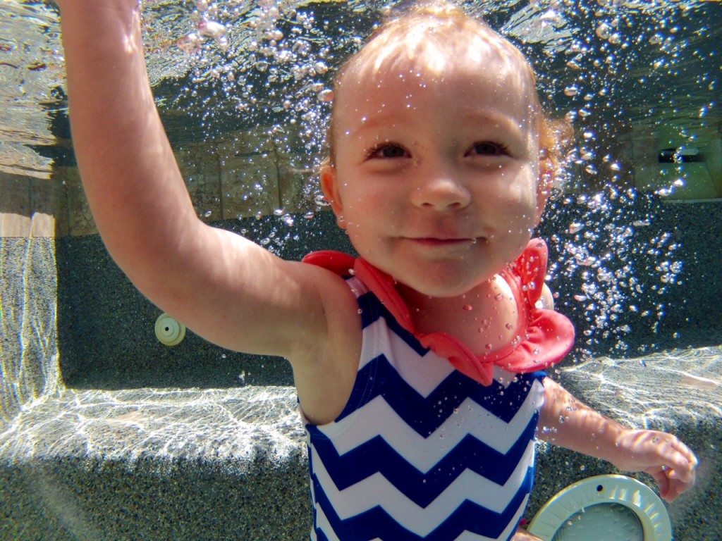 Child Swimming in Salt and Pepper Pool